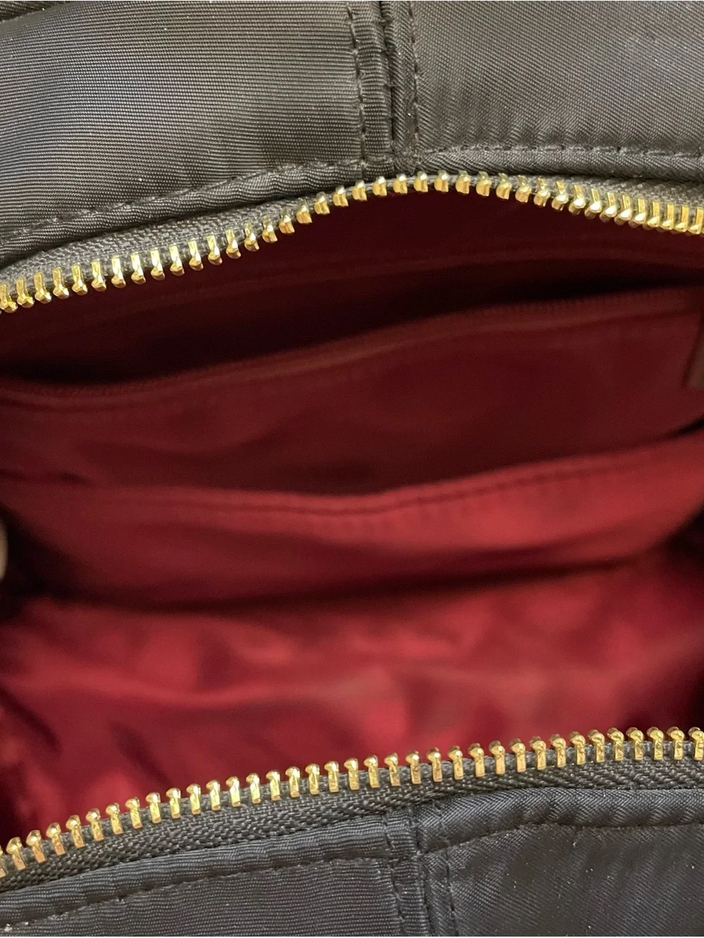 Doterra Black Quilted-Bottom Backpack with Gold Accents